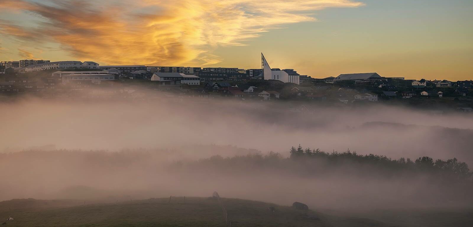 Views of Hoyvík in mist