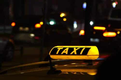 Taxi sign at night